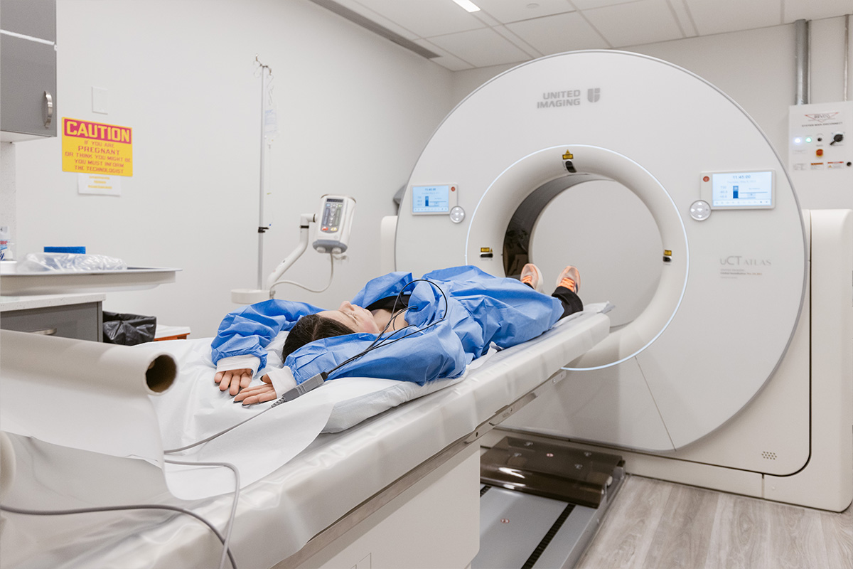 woman receiving a CT scan